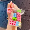 Llavero Colgante Creativo de Bloques de Construcción DIY de Dibujos Animados Colgante para Mochila Escolar de Niños Llavero de Coche Regalo Venta al por Mayor