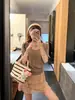 Conjunto de Duas Peças Tricô Gola V Manga Curta Estilo Coreano Saia Midi Evasê Cintura Alta 2026 Novo Estilo Verão Recorte Chique para Mulheres
