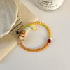 Pulsera de diseño de nicho para mujer, pulsera de cuerda trenzada hecha a mano, pulsera de la suerte de cuerda roja, pulsera de joyería de cerámica