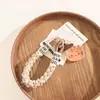 Colgante de Gato Kt de Madera Sintética de Moda Lanyard para Teléfono con Clip Llavero para Coche Accesorio Universal para Funda de Teléfono