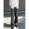 Estilo urbano de otoño: pantalones versátiles, geniales y casuales. Moda japonesa minimalista de alta costura, adelgazantes y que alargan las piernas, pantalones ligeramente acampanados para hombre