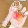 Llavero de Botella de Arena Movediza Hada Delfín, Colgante Exquisito y Lindo de Botella a la Deriva para Coche, Decoración de Mochila, Pequeño Regalo