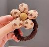 Nova corda de cabelo de outono não machuca cabelo elástico para cabelo meninas flor de tecido faixa de cabelo bola cabeça rabo de cavalo joia de couro