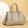 Bolso de mano para mujer transfronterizo, gran capacidad, modelo nuevo para el trabajo y los desplazamientos, bolso tote de alta calidad, bolso de hombro y cruzado