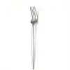 Juego de cubiertos de acero inoxidable para comida occidental Amazon transfronterizo portugués, cuchillo, tenedor, cuchara, cucharilla de té, 4 piezas principales, traje, venta al por mayor de fábrica
