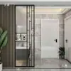 Pantalla de hierro forjado de lujo ligero, mampara de acero inoxidable y vidrio, recibidor, sala de estar, tocador minimalista moderno de celebridad de internet no