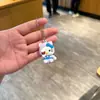 Nuevo Llavero de Dibujos Animados Sanrio Gato KT Colgante para Mochila Decoración de Bolso de Niña Muñeco Juguete Regalo Venta al por Mayor