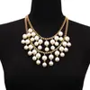 Collar exagerado de moda transfronteriza europea y americana, collar de perlas de imitación grandes de doble capa con borlas y cadena corta de clavícula para mujer.