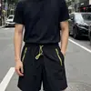 260508001 Pantalones cortos deportivos de secado rápido con bloques de color estilo montaña para exteriores con bolsillo con cremallera para parejas, finos y de ajuste holgado para verano