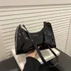 Bolsa de Couro Patente Tendência deste Ano para Mulheres, Nova Bolsa de Ombro Versátil Fashion Primavera/Verão 2026, Bolsa Transversal, Bolsa Baguette