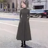 Vestido preto de manga comprida estilo francês feito sob medida para mulheres, novo vestido slim fit de corte A com acinturamento para primavera/outono de 2026