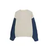 Suéter de patchwork de mezclilla, un diseño de dos piezas simulado para mujer, otoño/invierno 2026, estilo nuevo, top de punto holgado