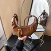 Bolso tipo empanada de diseño retro de nicho transfronterizo, bolso cruzado moderno para el día a día, bolso de hombro único a la moda, bolso de cuerno para debajo del brazo
