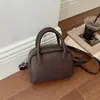 Moda retro de otoño 2026 transfronteriza bolso de hombro casual color sólido bolso de mano versátil bandolera para el día a día