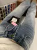 Jeans acampanados lavados azul claro estilo americano para mujer, nueva colección otoño 2026, de cintura alta, no ajustados y con una silueta fluida