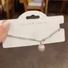 Pulsera de moda elegante estilo coreano, simple, con costura de punto de diamante y perla, para mujer, personalidad, lujo ligero, de alta gama, versátil, pulsera al por mayor