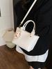 Bolso de Cubo de Mano de Alta Gama de Comercio Exterior Verano 2025 Bolso de Hombro Simple y Versátil Tendencia de Diseño de Nicho Bolso Cruzado