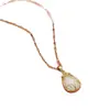 Colgante de tulipán bañado en oro de cobre vietnamita, nuevo, moderno, de gran venta, de alto valor, con piedra ojo de gato y cadena de labios, al por mayor