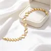 Pulseira Xuping quadrada geométrica emendada, moda transfronteiriça europeia e americana em liga de cobre, joia de fecho levemente luxuosa e elegante para atacado de mulheres