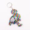 Llavero de dinosaurio de lentejuelas reflectante de doble cara, colgante para bolso de mujer, accesorios al por mayor