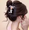 Nuevo Modelo 2025 Diseño Sencillo Pinza para el Cabello de Tiburón con Forma de Ola para la Parte Trasera de la Cabeza, Pinza Grande de Gama Alta para Mujeres