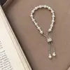 "Luz de Luna Blanca" Pulsera de Tirar de Perlas de Imitación Simple Francesa Moda de Gama Alta Pulsera Pequeña Destellante para Cintura de Hombre Versátil
