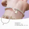 Pulsera de cuentas de cristal blanco y plata, amuleto de la fortuna, pulsera en capas de estilo chino nuevo para mujer