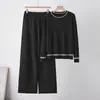 Conjunto de punto de dos piezas de comercio exterior Temu transfronterizo, con un suéter de cuello redondo y pantalones casuales de corte holgado, tejido de punto de manga larga