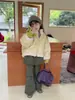 26 Calça-Saia de Inverno para Meninas Estilo Casual Retrô Americano Peça Falsa Dupla com Bolsos Grandes e Calças Ligeiramente Flare Forradas com Fleece para Exportação