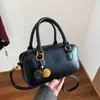 Otoño 2025 Nuevo Color Sólido Exquisita Moda Portátil Hombro Bolso Casual Bolso Mensajero de Moda de Nueva Textura para Mujer