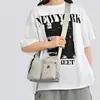 Bolso de hombro de nailon nuevo 2026 para mujer, bandolera simple y casual, gran capacidad, versátil para ir al trabajo y con estilo deportivo.