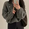 Nuevo estilo chic coreano para otoño e invierno, suéter de punto esponjoso de cuello en V holgado y relajado, suéter casual simple versátil para mujer
