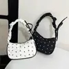 Bolso de lunares bolso de mujer 2026 nuevo fresco bolso de axila dulce bolso de mano plisado textura de nicho bolso de hombro único para mujer