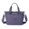 Bolsa de Tecido de Nylon Transfronteiriça Nova Bolsa de Mão Feminina Multifuncional Portátil Grande Capacidade Versátil Casual Bolsa de Ombro Atacado