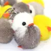 Mini peluche de pollo de pelo de visón súper lindo, colgante de patito de peluche amarillo para bolso, accesorio de teléfono, llavero de pato, venta al por mayor