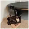 2026 Nova Bolsa de Mão com Corrente Estilo Pequeno Perfume Bolinhas Bolsa de Ombro Único Estilo INS Moda Simples Elegante Bolsa Saco Feminina