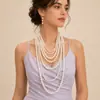 Juego de joyería de novia transfronterizo moda popular europea y americana cadena de suéter multicapa con cuentas de perlas de imitación pendientes para mujer