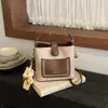 Bolso Bandolera Relajado Estilo Coreano Retro de Nicho 2026 Otoño Nuevo Bolso Cubo de Alto Valor a la Moda