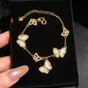 Pulsera de Calabaza Láser Arena Dorada de Alta Retención de Color Tienda de Oro Mismo Estilo Pulsera de Mariposa Brillante Pulsera de Trébol de Cuatro Hojas Exquisita de Nicho
