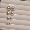 Pendientes de botón de perla S999 plateados por todas partes para mujer, sencillos y elegantes, pendientes de lujo ligero de alta gama, nuevo modelo popular 2026