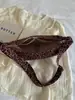 Lona fresca y elegante con estampado de leopardo 2026 nuevo modelo de verano ins de moda versión coreana bolsa tipo dumpling bolsa de axila de alto valor