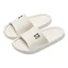 Novas pantufas femininas de EVA com listras de letras, macias para o verão, de banheiro, antiderrapantes, silenciosas, chinelos de casa para casal