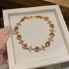 Pulsera redonda simple de flor de circón chapada en oro real de 18k para mujer, pulsera de moda de alta gama, joyería elegante y versátil
