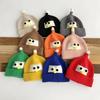 Gorro de bebé otoño e invierno coreano nuevo para hombre y mujer para niños protección para las orejas lindo gorro de lana chupón de bebé gorro de ojos grandes