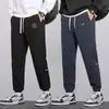 Pantalones gruesos de pana para primavera y otoño para hombre, pantalones largos casuales de trabajo, pantalones deportivos de chándal con retazos, chenilla de moda