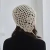 Gorro de Cachemira Tejido a Mano con Ganchillo Transfronterizo al por Mayor con Diseño Bohemio Hueco y Borlas