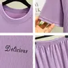 Camiseta de Seda de Gelo de Manga Curta para Mulheres Verão 2026 Novo Estilo Solta Casual Gola Redonda Conjunto Fino Slimming Visual Cor Lisa Conjunto de Duas Peças