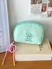Bolsa de cosméticos para cachorros felices transfronteriza estilo simple Macaron ins gran capacidad bolsa de almacenamiento para empaque de ropa interior