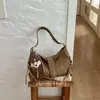 2026 Nova Bolsa de Ombro Texturizada Simples Estilo Europeu e Americano Grande Capacidade Bolsa Tote Fashionável para o Dia a Dia para Mulheres