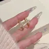 Aretes de estilo minimalista transfronterizo con circonita cúbica completa, lujo ligero con un toque de alta gama, diseño de nicho, versátiles, exquisitos, elegantes y modernos ear cuffs